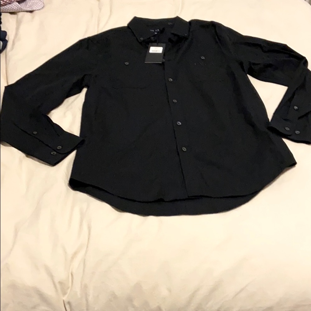 Black button up dress shirt. Five four.